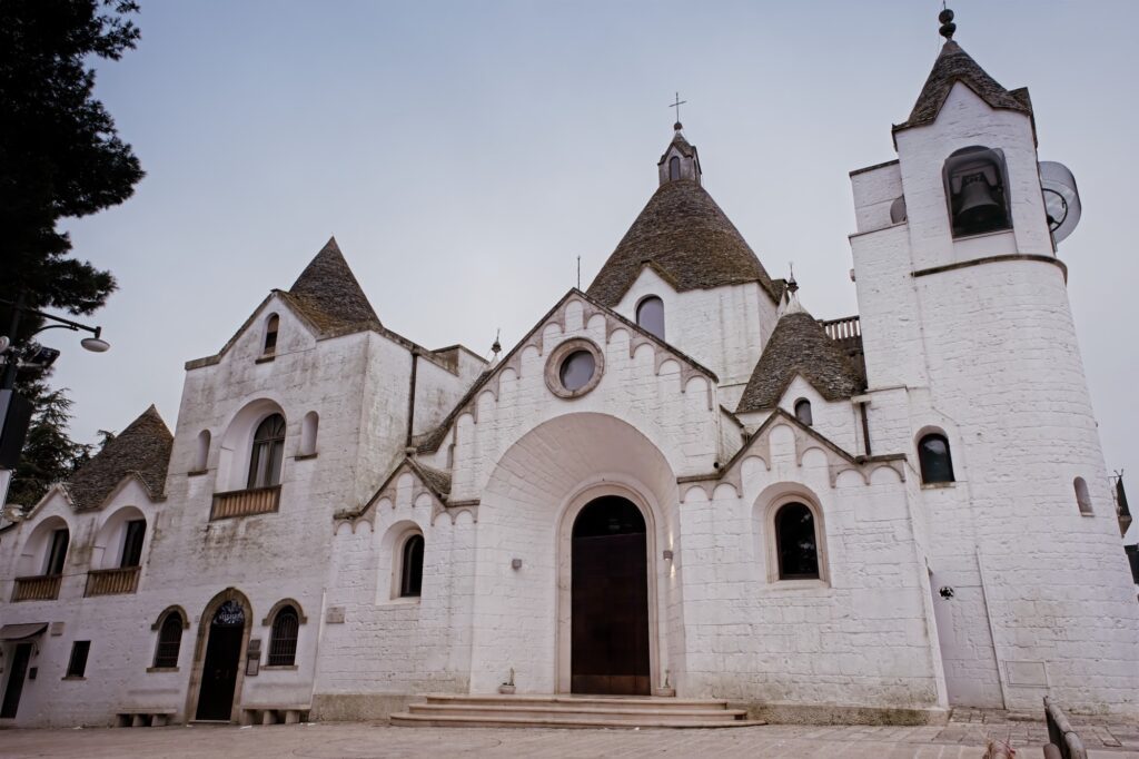 Grand architectural editorial of the Sant'Antonio di Padova Church, the only Trullo-style church in the world