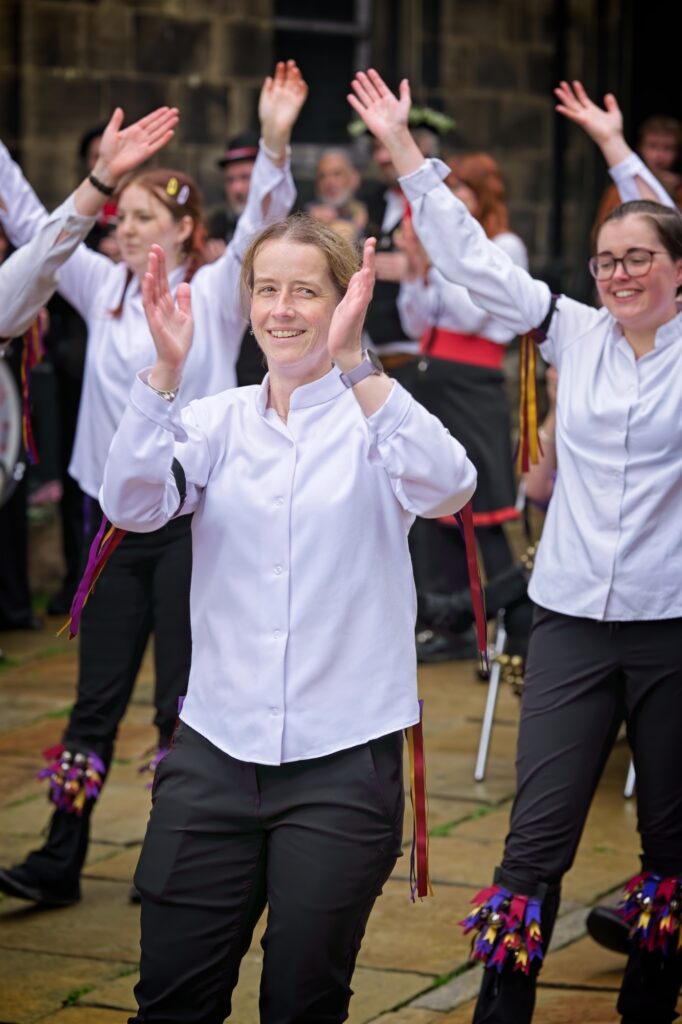 Editorial portrait of a folk dancers at the Holmfirth Festival of Folk, captured in a documentary style