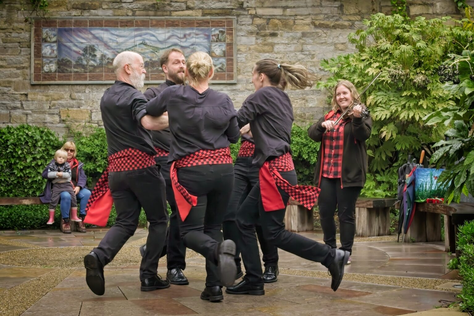 Cinematic group shot of folk dancers in Holmfirth, captured by Guy Parker Photography